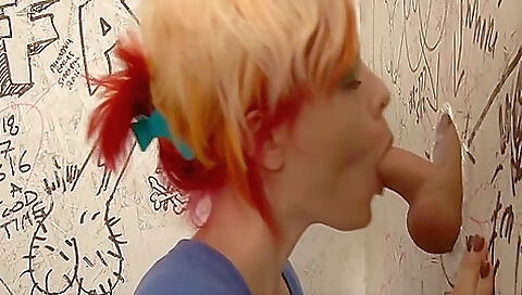 Submissive trans slut with big boobs fucked in the glory hole