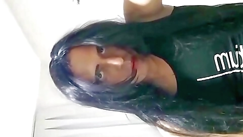 Beautiful brunette ladyboy in stockings enjoys a solo vid