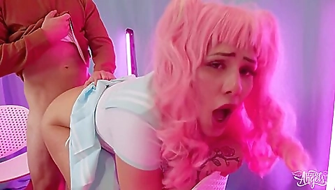 Redheaded bitch strips naked and fucks on the bed in reverse